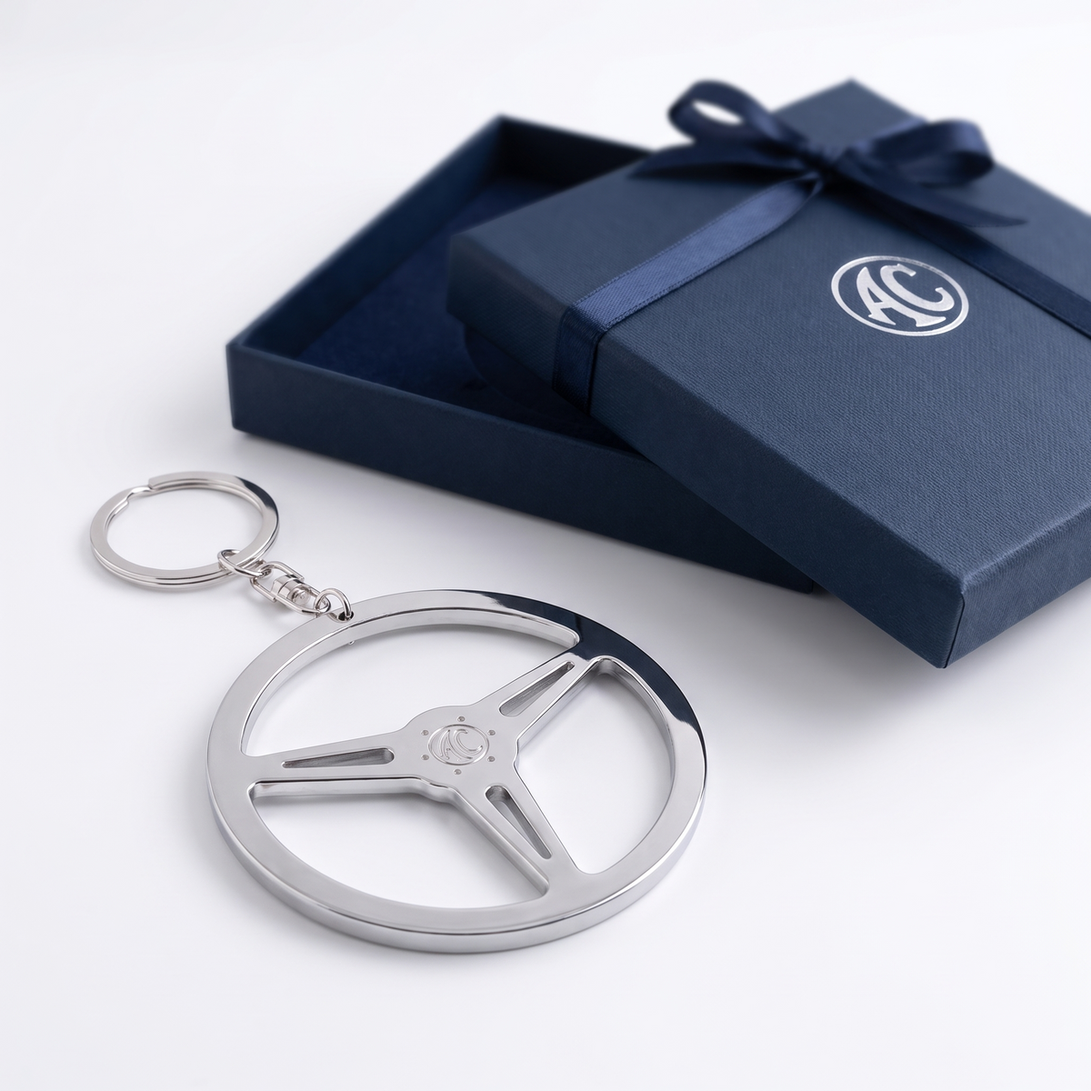 AC STEELING WHEEL KEY RING